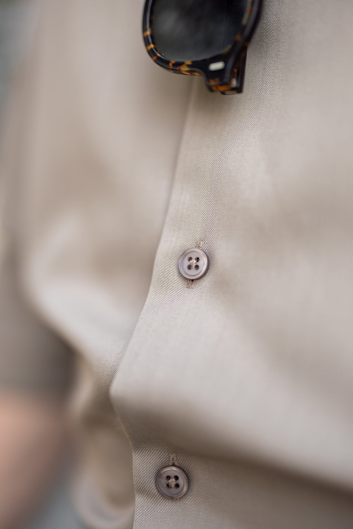 Close view of a LOOW merino shirt and its buttons